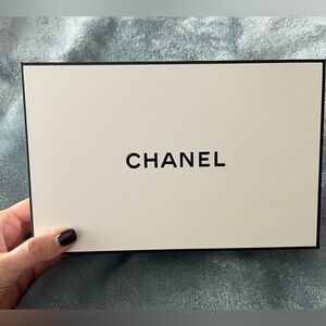 CHANEL Cream Box with Black Trim, bag and ribbon